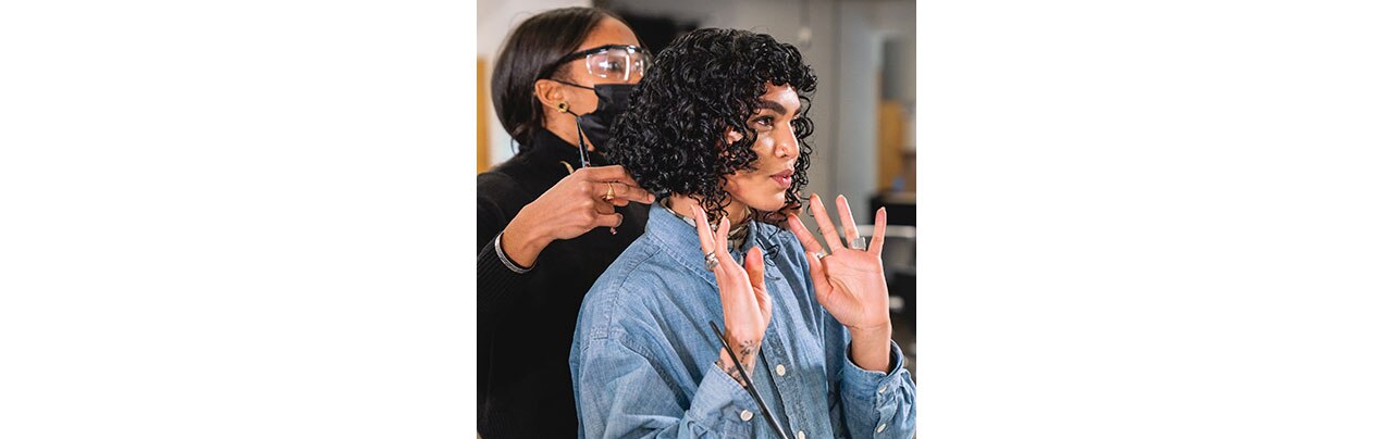 Sophia Roe getting a hair cut from Global Artistic Director of Texture, Renée Gadar